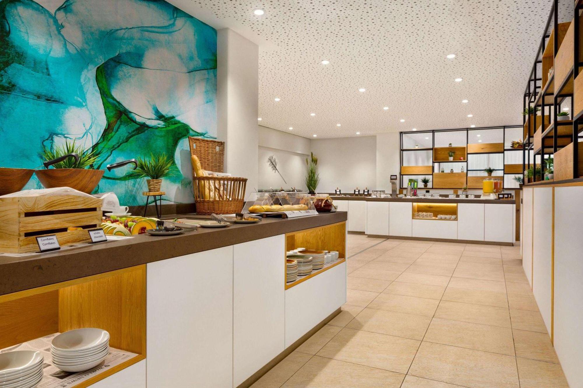 Wyndham Garden Messe Hotel 4*